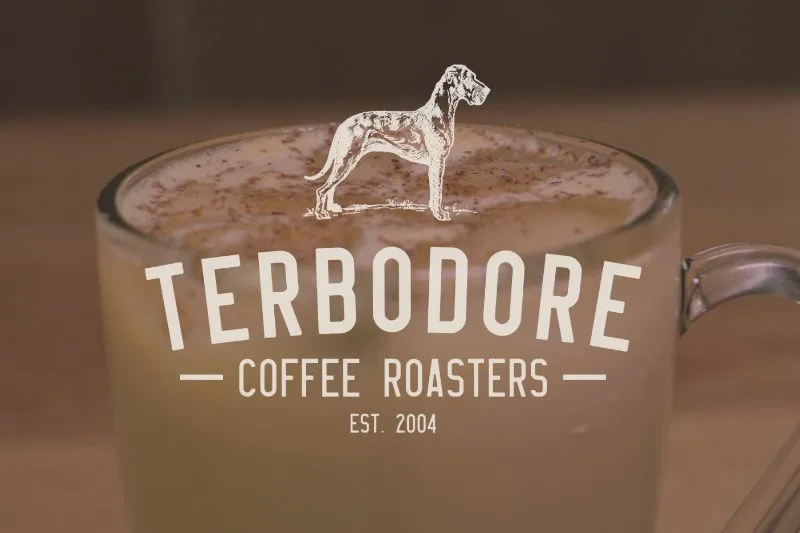 Terbodore Coffee Roasters logo with espresso eggnog in background