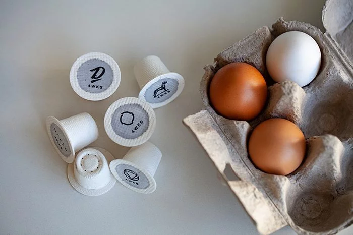 4WKS coffee pods - compostable next to an egg crate on a counter - Terbodore