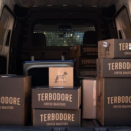 Back of a van filled with Terbodore Boxes